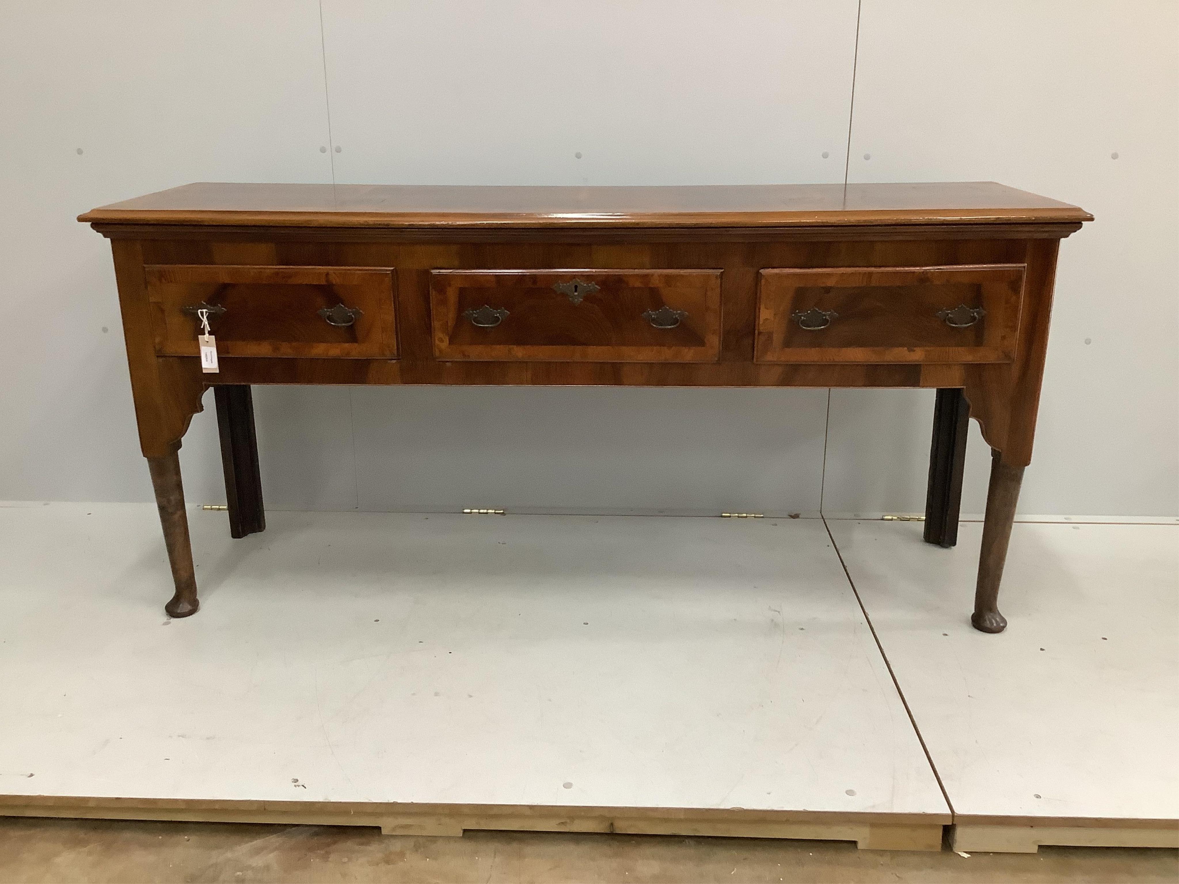 A George II style elm and burr walnut banded low dresser, width 182cm, depth 51cm, height 85cm. Condition - good